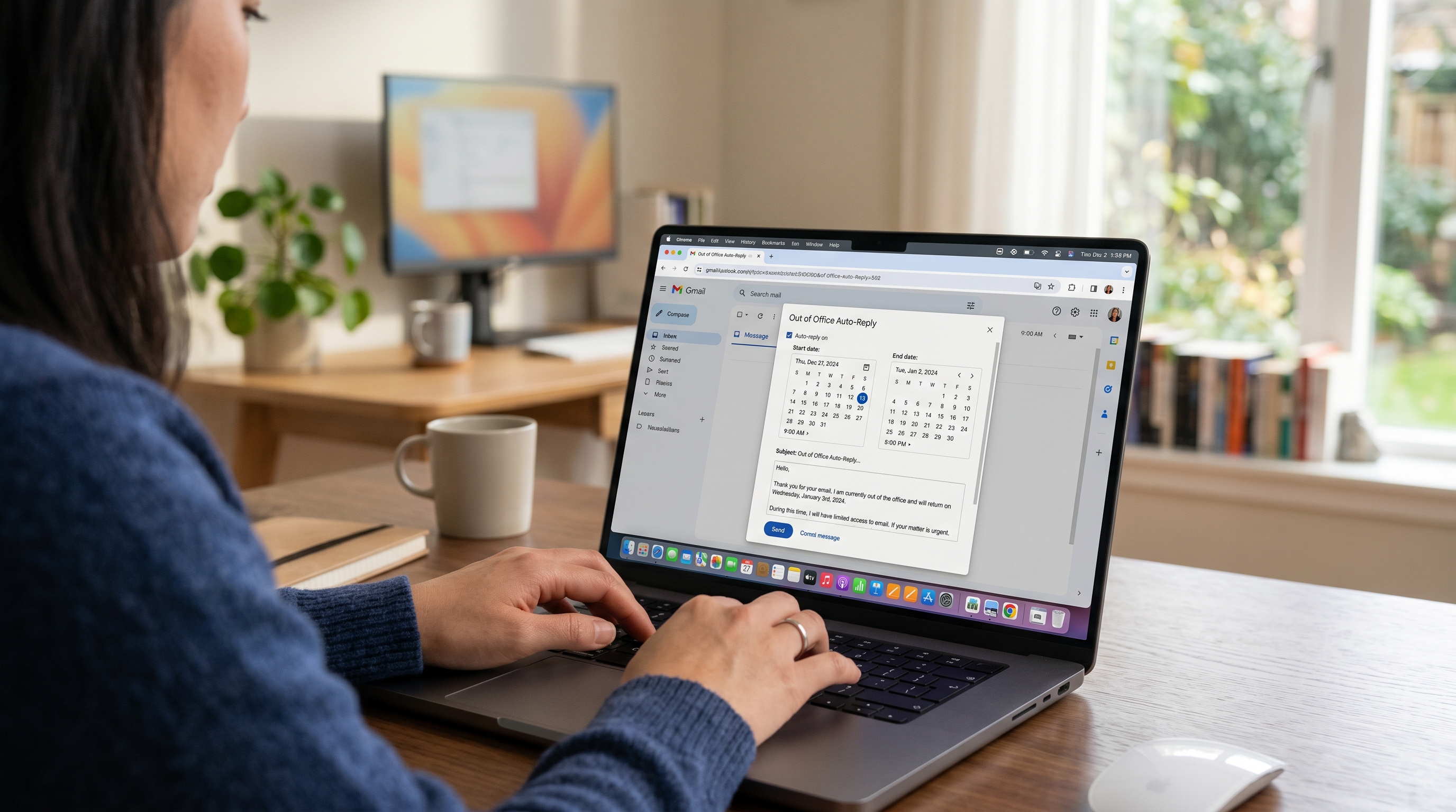 Laptop screen showing auto-reply settings with scheduled return dates for an out-of-office message