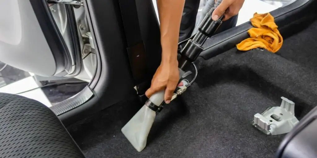 A man cleaning a car 