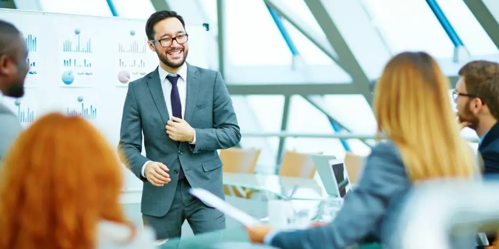 Positive CEO holding a meeting