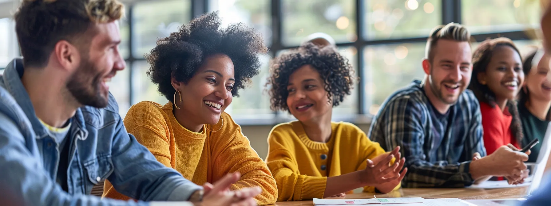 a diverse group of employees from different backgrounds and expertise passionately discussing and brainstorming ideas around a table in a brightly lit conference room.