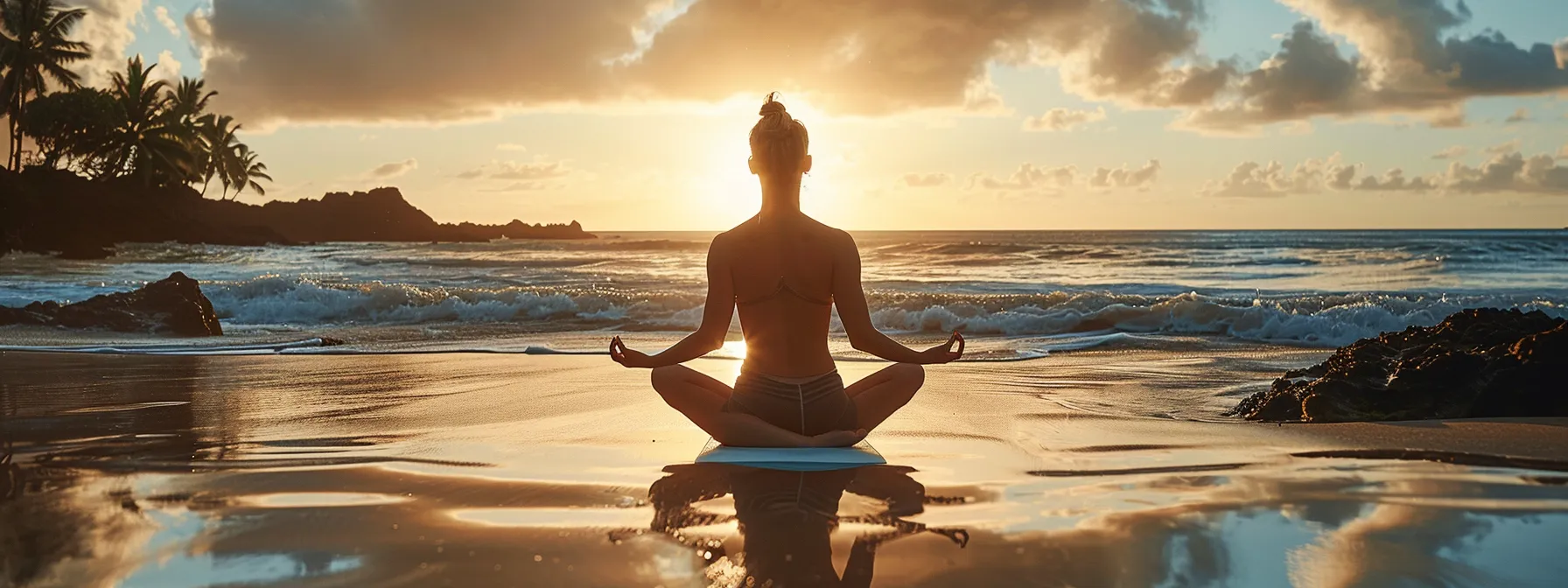 a tranquil sunrise yoga session on a serene beach, showcasing a leader prioritizing self-care and balance in their daily routine.