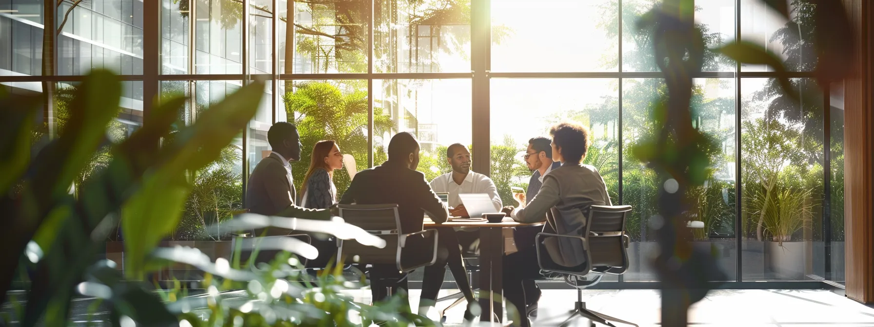 a group of diverse professionals discussing strategies and collaborating in a modern office setting, showcasing teamwork and leadership skills.